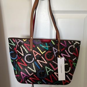 Brand New, Never Used Calvin Klein purse.  Adorable with any outfit!